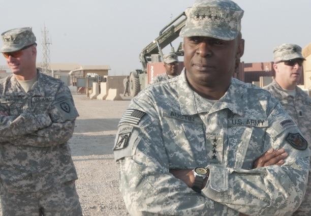 A group of men in military uniforms

Description automatically generated with low confidence