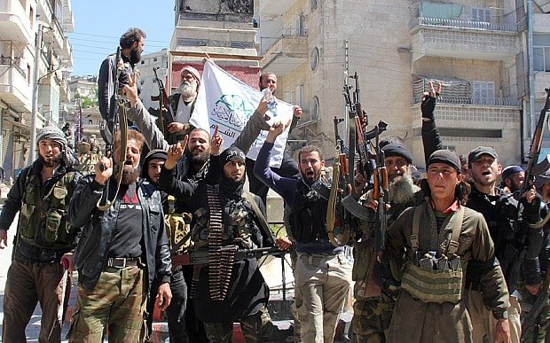 A group of people holding flags
Description automatically generated with low confidence