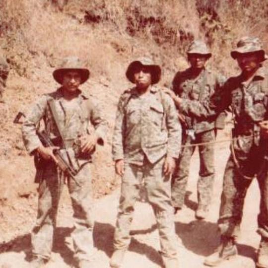 A group of people in military uniforms
Description automatically generated with medium confidence