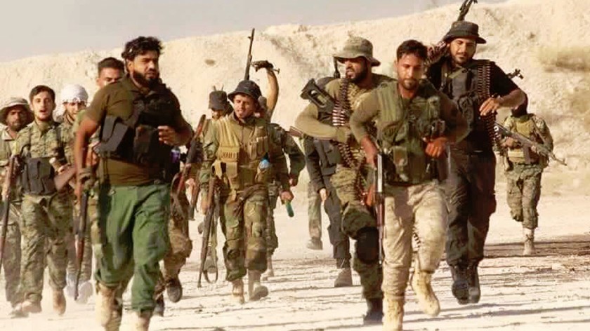 A group of people in military uniforms
Description automatically generated with low confidence