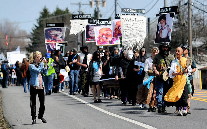 A group of people marching
Description automatically generated with low confidence