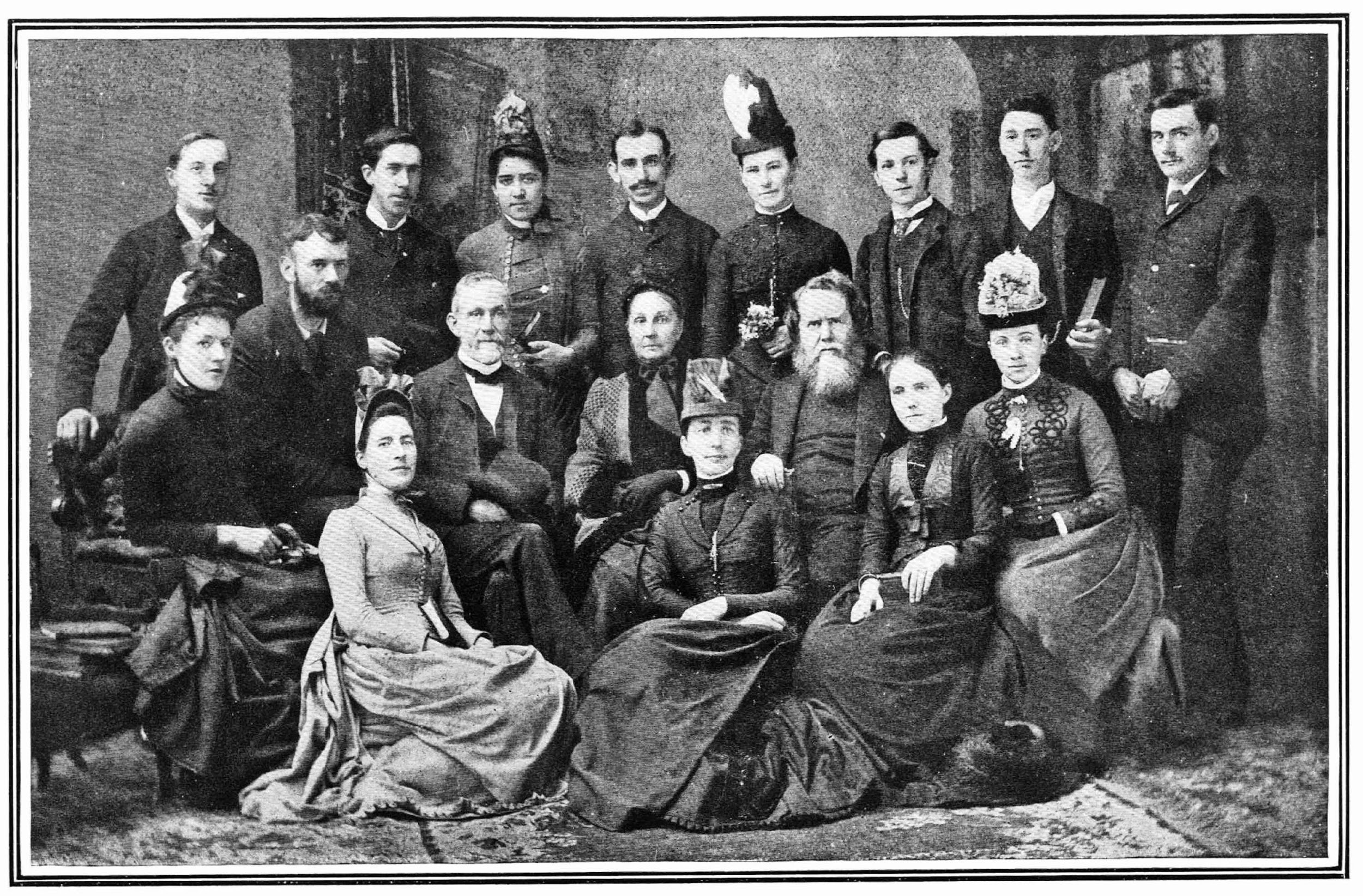 A group of people posing for a photo
Description automatically generated
