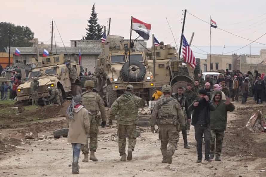 A picture containing sky, ground, outdoor, military vehicle
Description automatically generated
