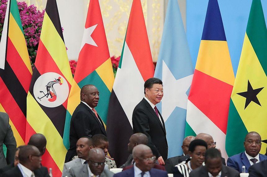 South African President Cyril Ramaphosa and Chinese President Xi Jinping at the Forum on China-Africa Cooperation summit in Beijing yesterday. The summit adopted an action plan, identifying eight major initiatives as the focus of China-Africa coopera