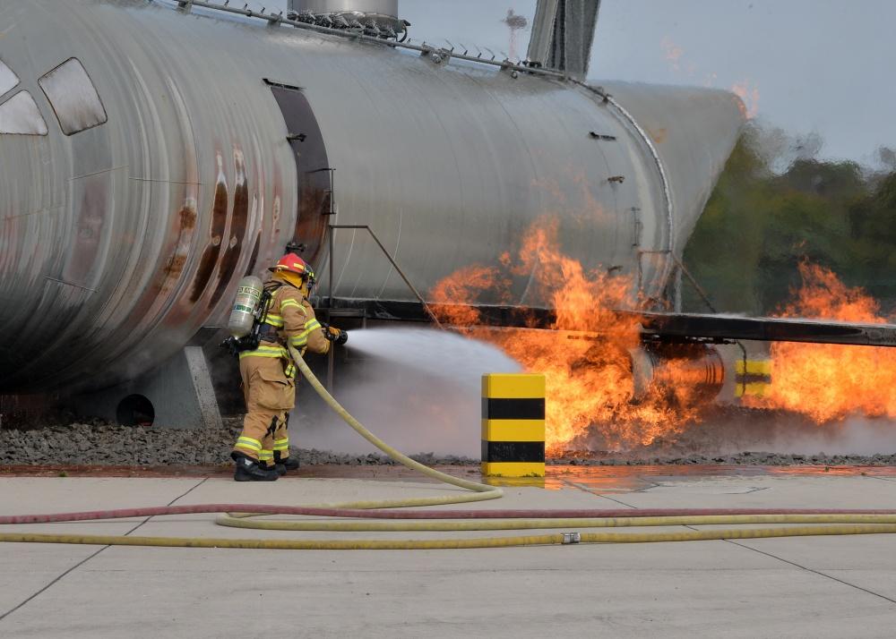 A firefighter practices dousing flames using carcinogenic foam at Ramstein Airbase, Germany October 6, 2018. - U.S. Air Force photo.