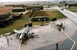 An airplane on a runway

Description automatically generated with low confidence