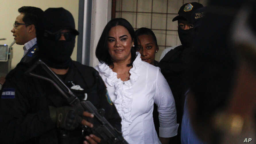 Former Honduran first lady Rosa Elena Bonilla de Lobo smiles arrives to court for her sentencing on corruption charges in Tegucigalpa, Honduras, Aug. 20, 2019.