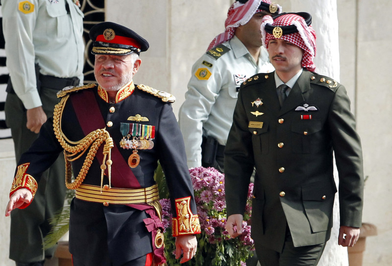 Jordan's King Abdullah II and Crown Prince Hussein (R) arrive for the opening session of the fourth ordinary parliamentary session  in the capital Amman on Nov. 10, 2019.