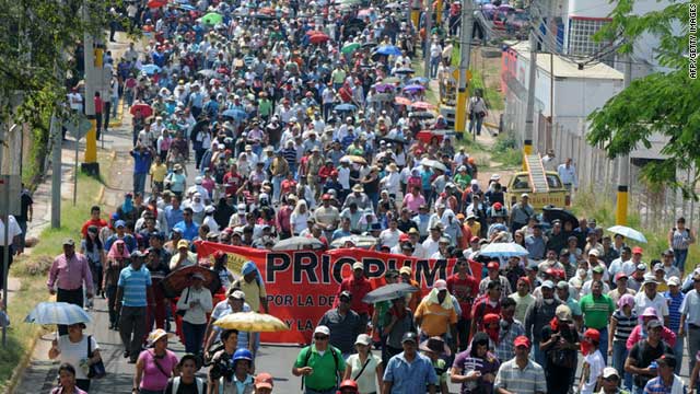 Teachers march against a bill that they say can lead to the privatization of education on March 24, 2011.
