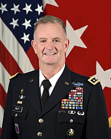 A person in a military uniform

Description automatically generated with low confidence