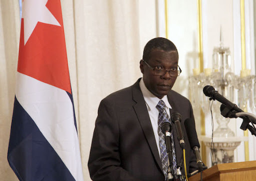 A person standing in front of a microphone

Description automatically generated with low confidence