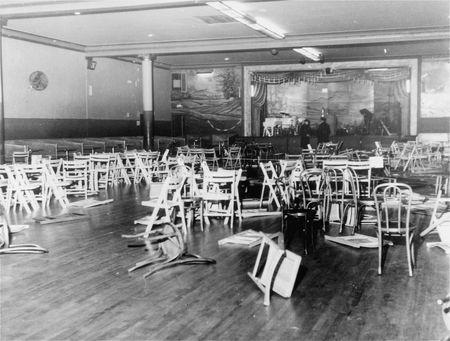 A room full of tables and chairs

Description automatically generated with low confidence