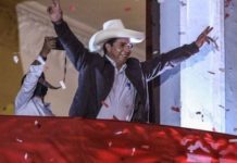 Socialist Pedro Castillo Wins Peruvian Election Over Dictator Alberto Fujimori’s Daughter: Former Military Commanders Encourage Electoral Coup Pedro Castillo greets from the balcony of his party's headquarters, Lima, Peru, June 15, 2021.
