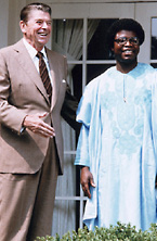 A couple of men posing for a picture
Description automatically generated with low confidence