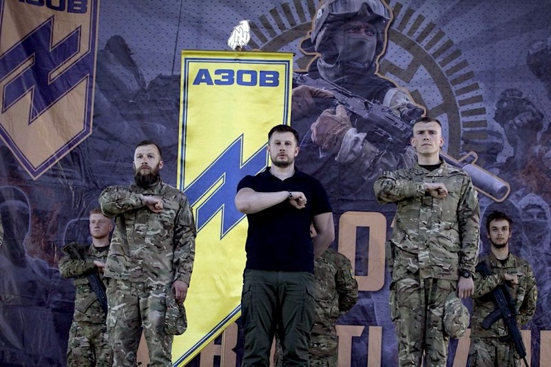 A group of people in military uniforms

Description automatically generated with low confidence