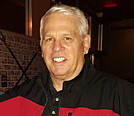A person smiling for the camera

Description automatically generated with low confidence