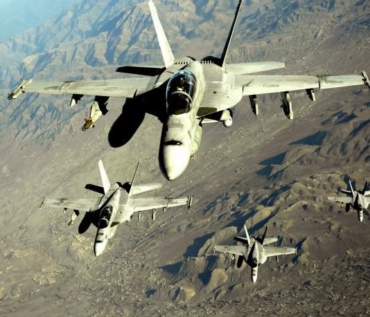 Biden Betrays Another Campaign Pledge—Admits that U.S. Will Continue to Bomb Afghanistan A picture containing mountain, outdoor, aircraft, transport Description automatically generated