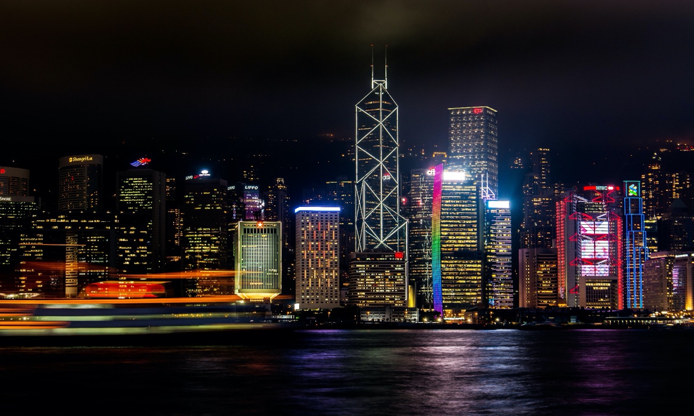 A city skyline at night
Description automatically generated with low confidence