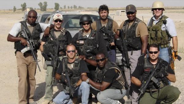 A group of people posing for a photo

Description automatically generated with medium confidence