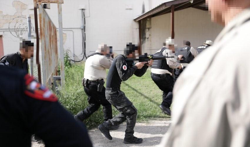A picture containing person, person, outdoor, sword

Description automatically generated