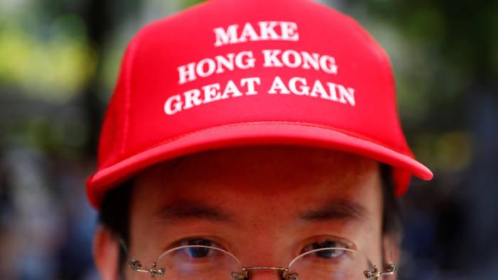 A protester is seen wearing a cap that reads, "Make Hong Kong Great Again" in Central, Hong Kong, China September 8, 2019. REUTERS/Kai Pfaffenbach