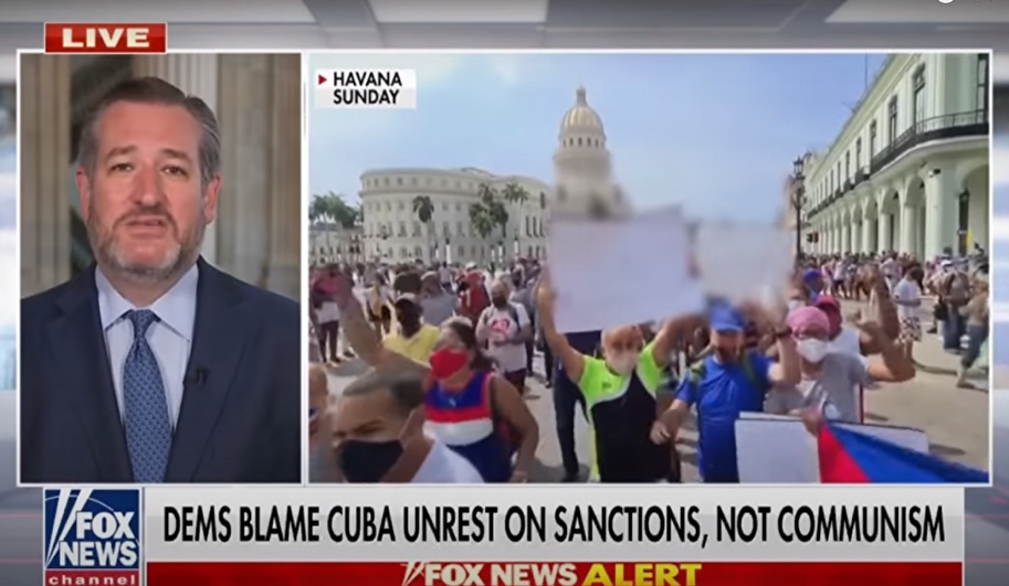 Fox News broadcast censors posters of pro-government demonstrators in Cuba. Screenshot.