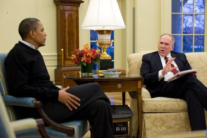Image may contain John O. Brennan Furniture Chair Human Person Sitting Plant Lamp and Table Lamp