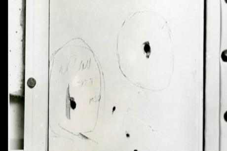 Marked Bullet Holes in Door Frame