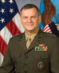 A person in a military uniform

Description automatically generated with low confidence