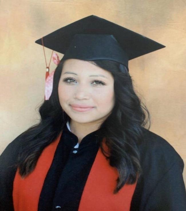 A person wearing a graduation cap

Description automatically generated with medium confidence