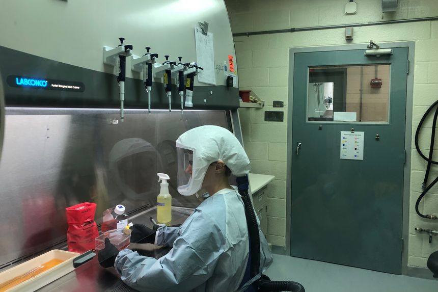 A picture containing indoor, person

Description automatically generated