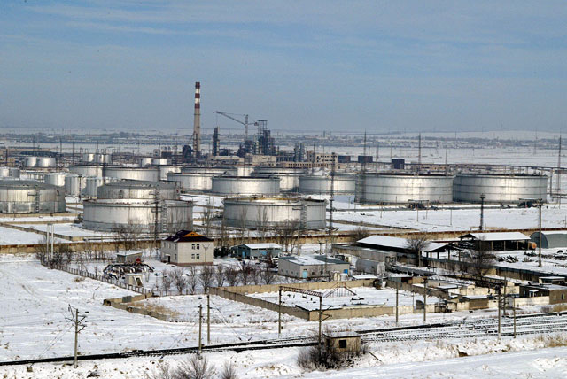 A picture containing outdoor, sky, factory

Description automatically generated