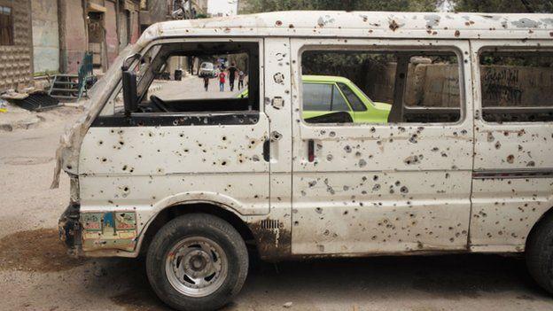 Syria conflict: Defiance inside Damascus rebel suburb - BBC News