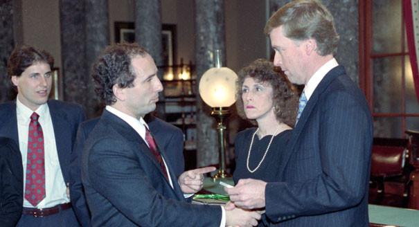 The new senator talks with Vice President Dan Quayle on Capitol Hill Jan. 3, 1991.  