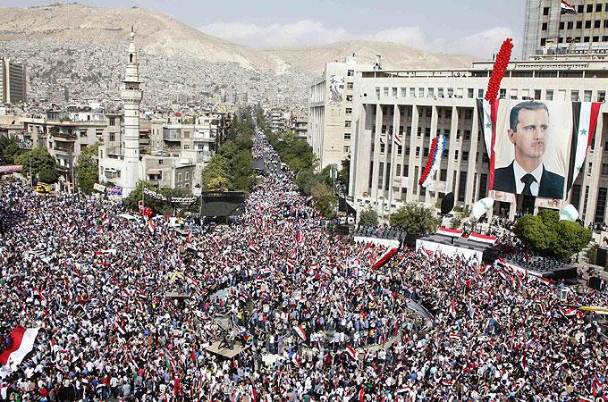 Thousands rally in support of Syria's Assad | China News | Al Jazeera