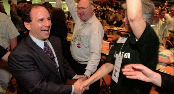 Wellstone shakes supporters' hands on his way to the podium June 8, 1996, at the St. Paul Civic Center to receive the nomination of the Democratic-Farmer-Labor Convention to run for a second term as Minnesota senator.  