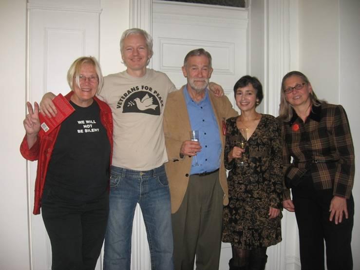A group of people posing for a photo
Description automatically generated