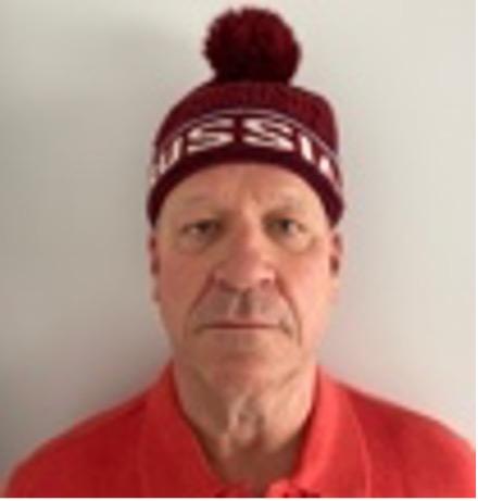 A person wearing a hat

Description automatically generated with medium confidence