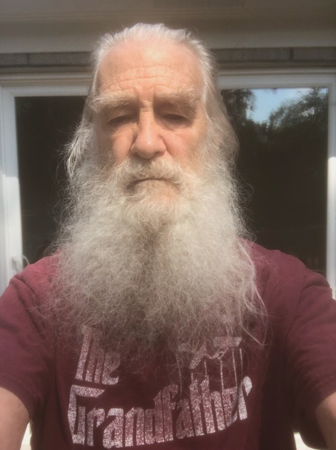 A person with a long beard
Description automatically generated with medium confidence
