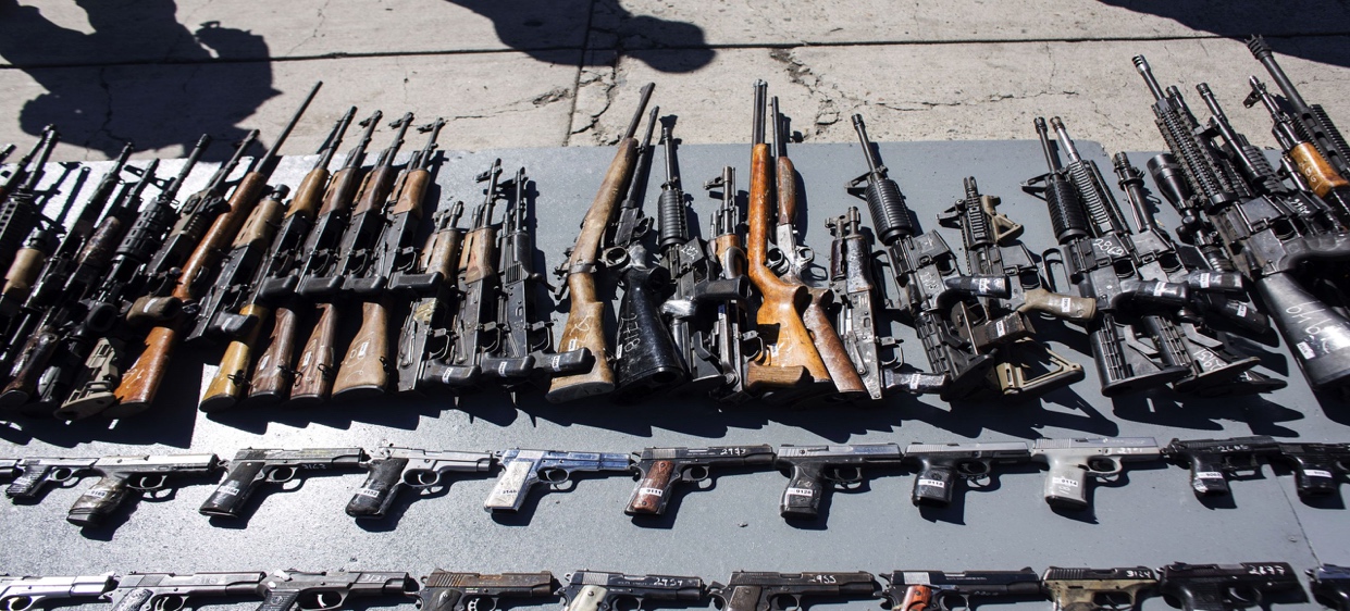 A picture containing weapon, bunch, several
Description automatically generated