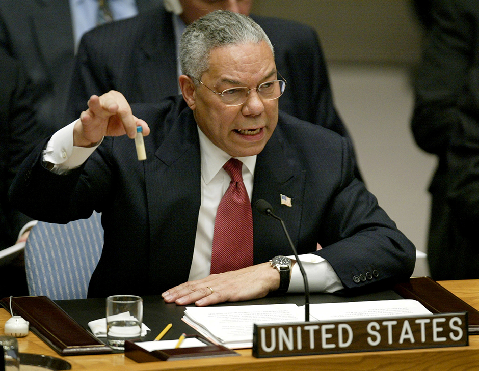 Secretary of State Colin Powell holding up a vial that he described as one that could contain anthrax, during his presentation to the U.N. Security Council in New York, February 5, 2003.