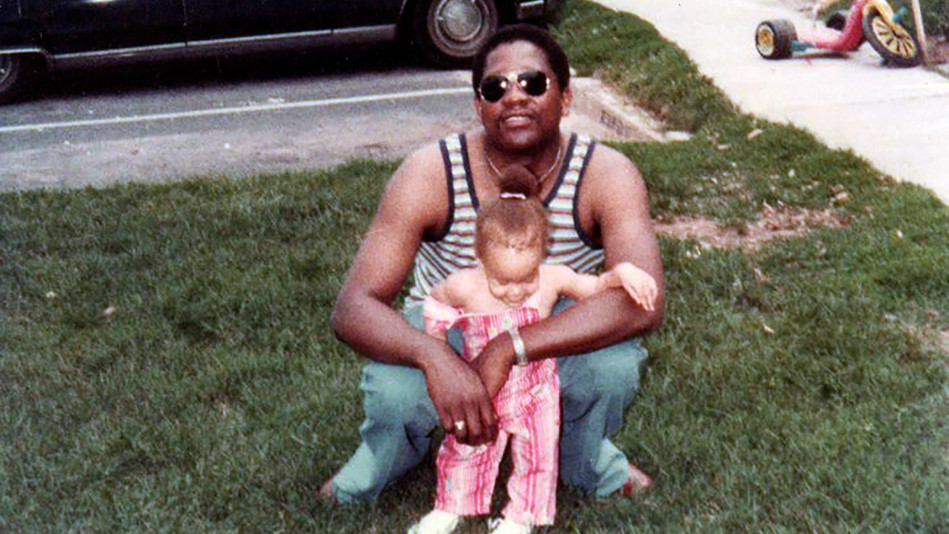 A person holding a baby
Description automatically generated with medium confidence
