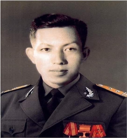 A person in a uniform

Description automatically generated with medium confidence
