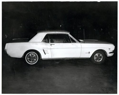 A picture containing text, car, outdoor, road
Description automatically generated