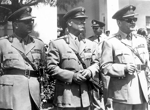 A group of men in military uniforms

Description automatically generated with low confidence