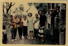 A group of people posing for a photo

Description automatically generated