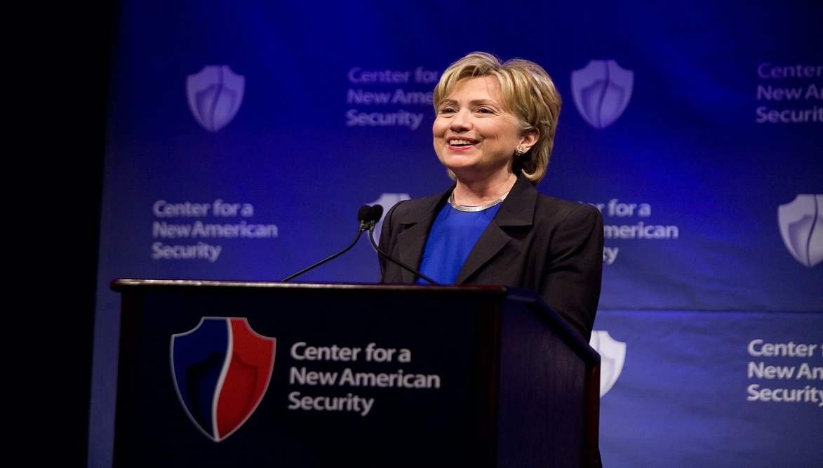 A person standing at a podium

Description automatically generated with medium confidence