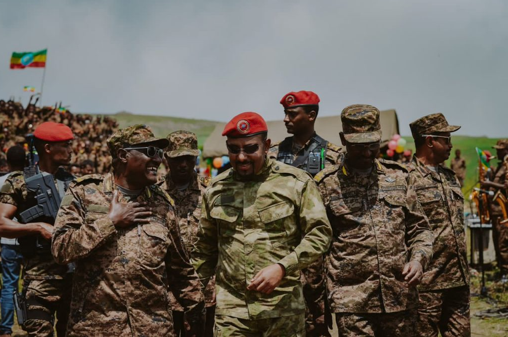A picture containing military uniform, person, military, clothing

Description automatically generated