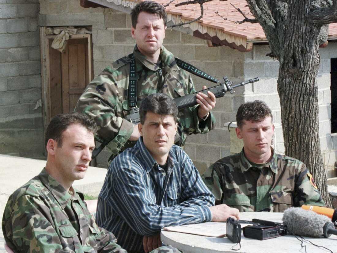 A picture containing person, military uniform, outdoor, person

Description automatically generated