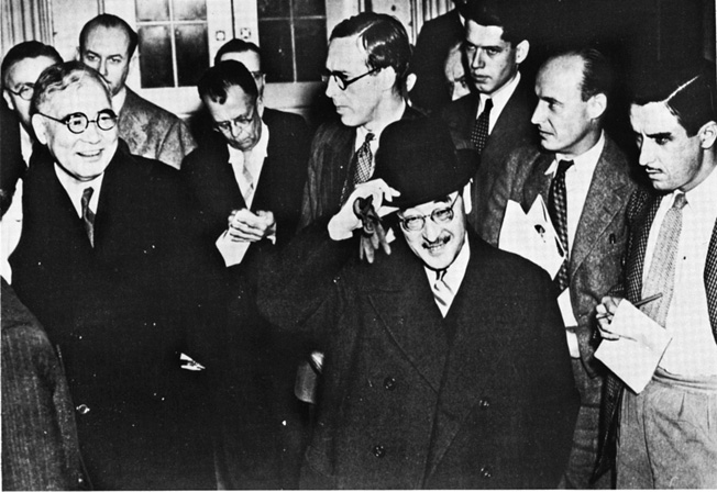 Japanese Ambassador Kichisaburo Nomura and Special Envoy Saburo Kurusu leave the White House after proposals they thought would avert the war were rejected. Little did they know that their mission was without hope.